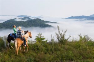 Kentucky horseback riders near Appalachian mountains