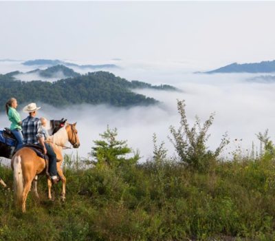 Kentucky horseback riders near Appalachian mountains